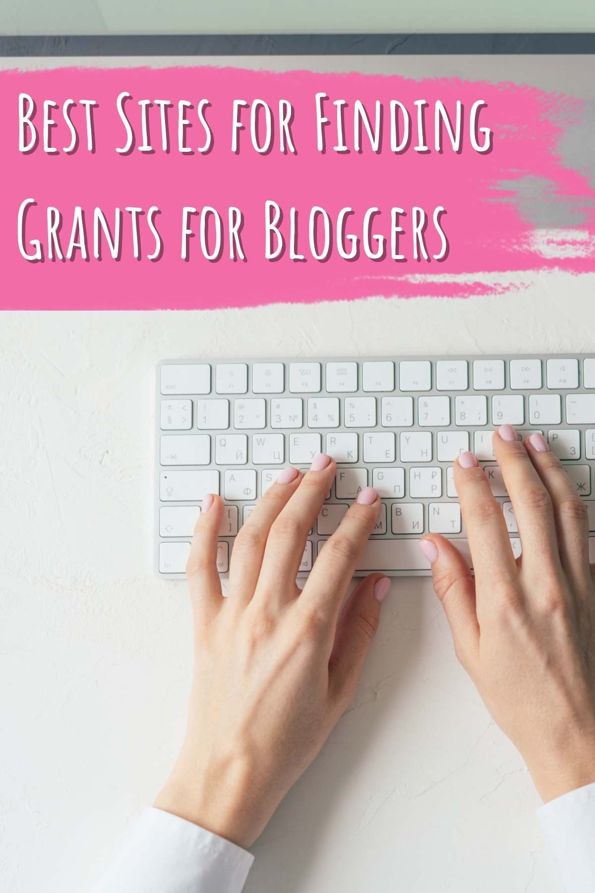 Best Sites for finding grants for bloggers. Photo of hands typing.